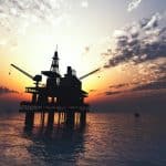 oil-drill-rig-platform-on-the-sea-sunrise_t20_9JmKYv